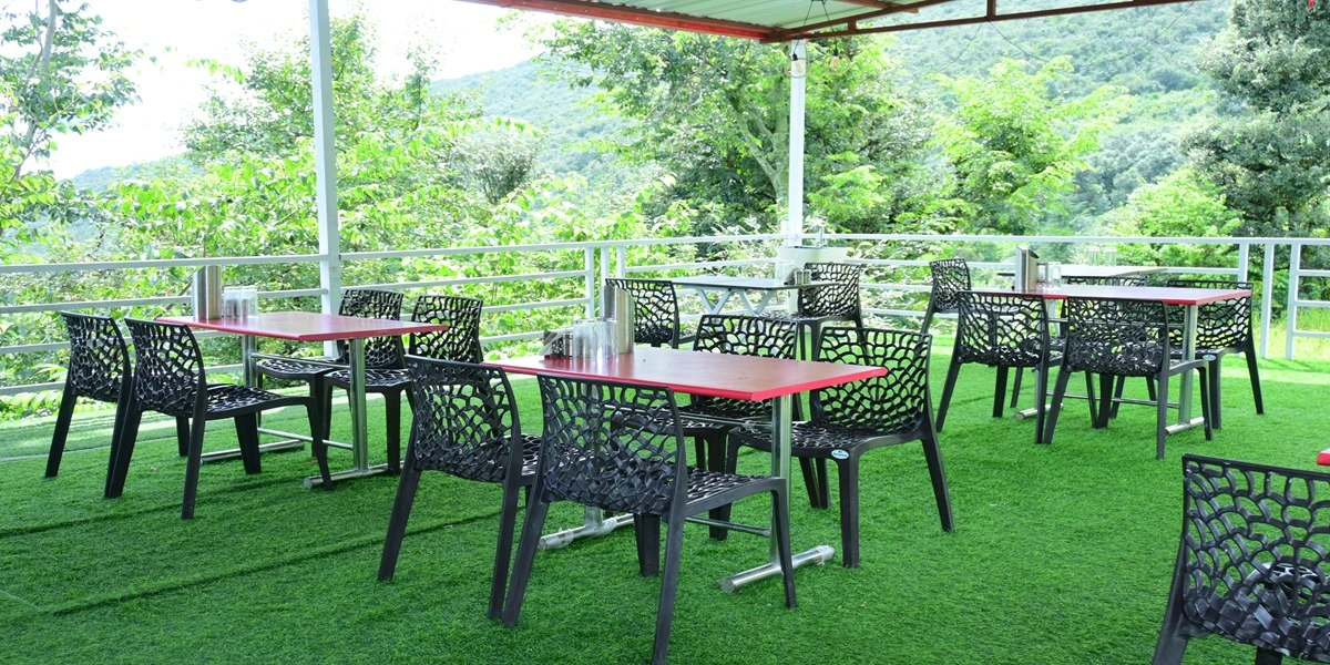 open dining area at musafir resort guptkashi